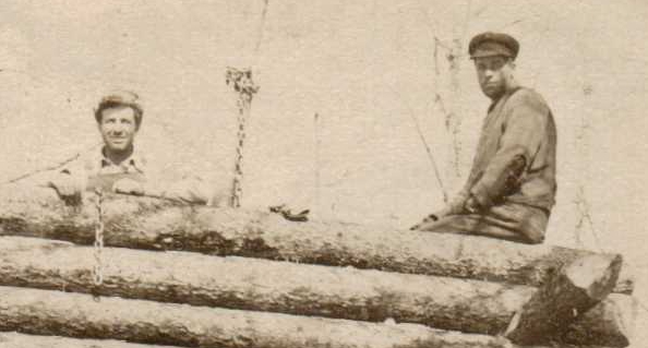 Closeup of Picture of Brooks Brothers work on Log Cabin in Peace River